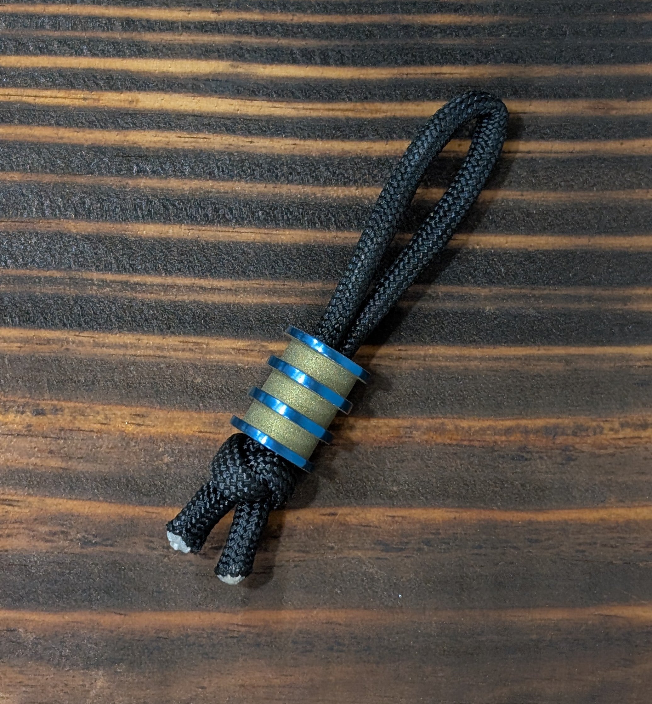 Grooved Four-Fin REACTOR Titanium Paracord Bead