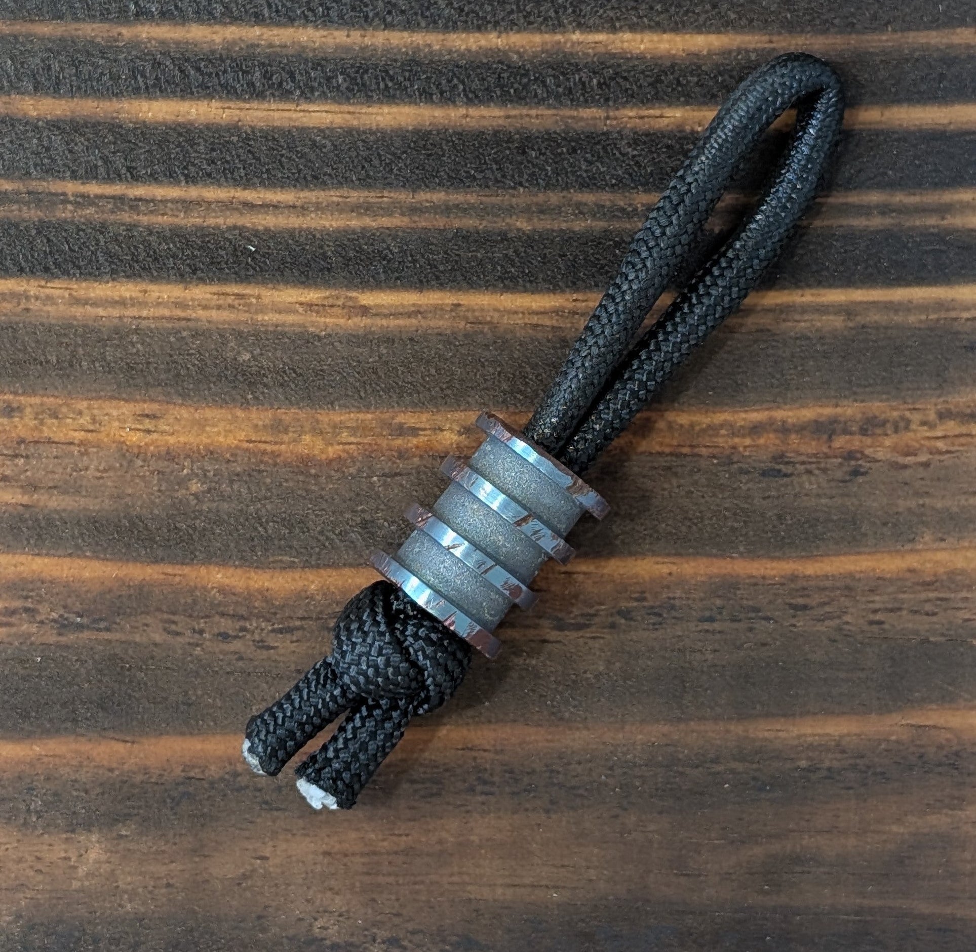 BATTLE-WORN REACTOR Titanium Paracord Bead